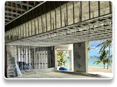 Atlas Insulation technician applying spray foam insulation in Miami home