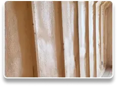 Open-cell spray foam insulation coverage in residential property